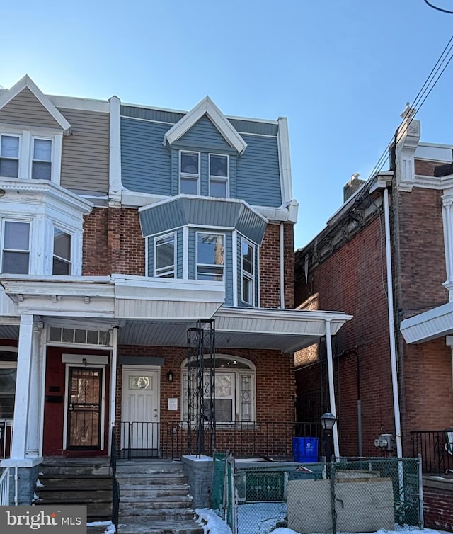 multi unit property featuring covered porch