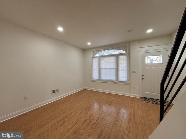 entrance foyer featuring light hardwood / wood-style floors