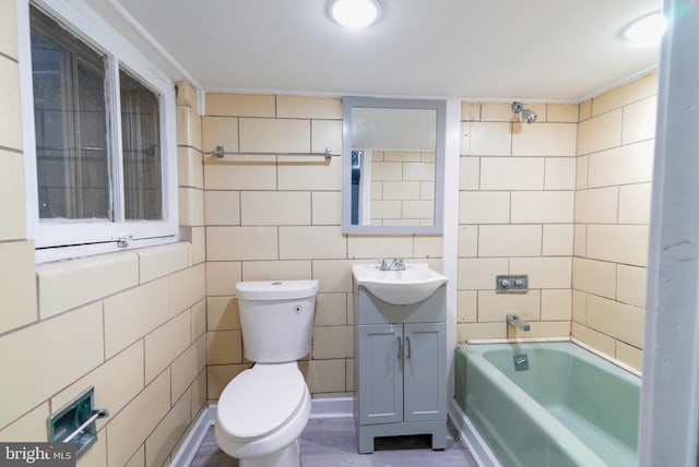 3603 Oakmont Ave, Baltimore, MD 21215 - bathroom featuring toilet, vanity, shower / bath combination, and tile walls