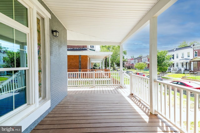 3603 Oakmont Ave, Baltimore, MD 21215 - wooden porch with a residential view