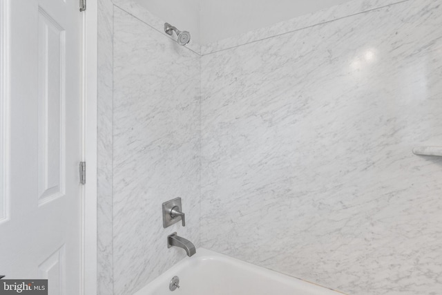 bathroom featuring shower / washtub combination