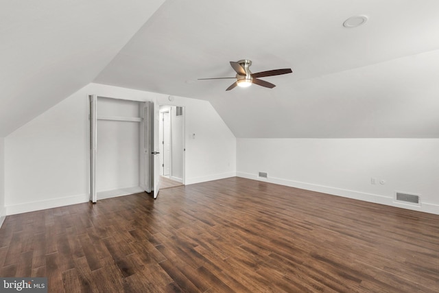 bonus room featuring vaulted ceiling, dark hardwood / wood-style floors, and ceiling fan