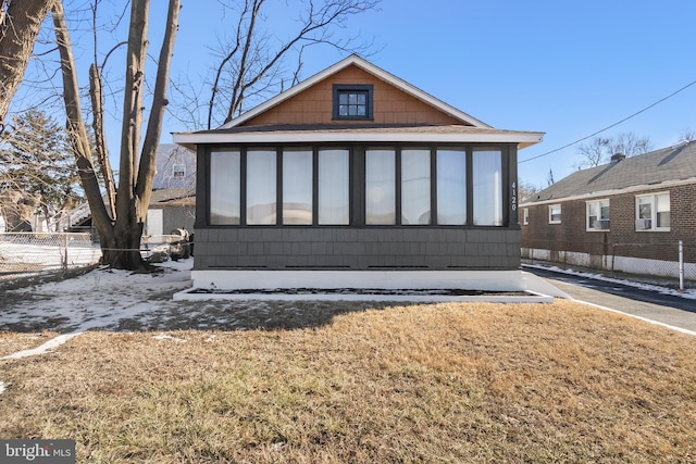 exterior space with a lawn