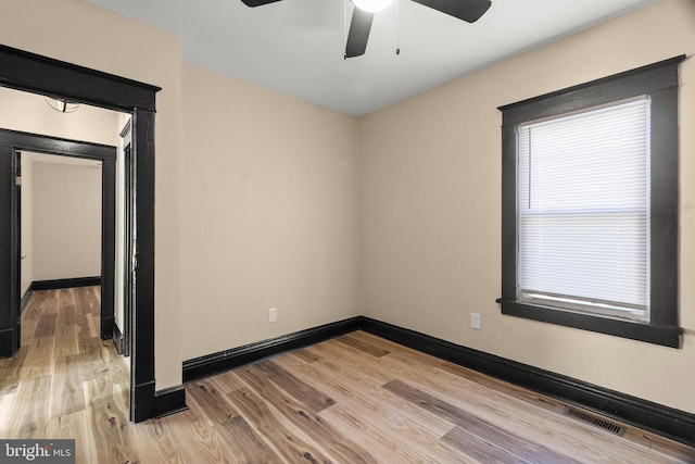 unfurnished room featuring light hardwood / wood-style flooring