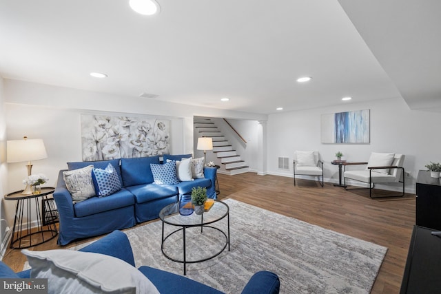 living room featuring dark hardwood / wood-style flooring