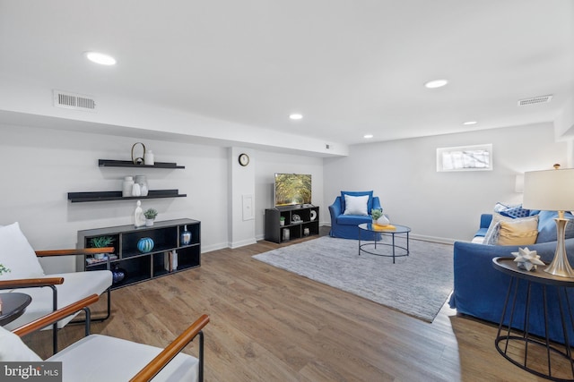 living room with hardwood / wood-style flooring