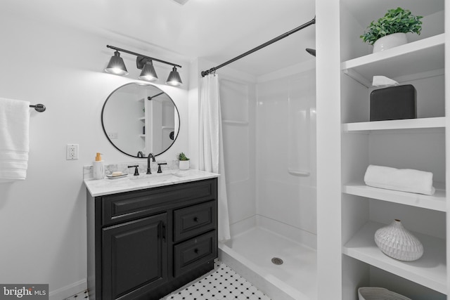 bathroom with vanity and walk in shower