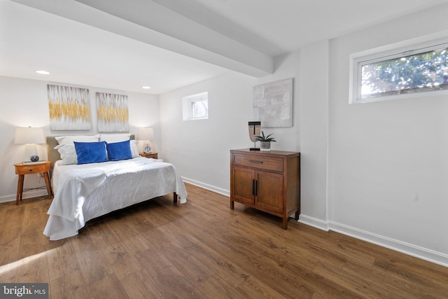 bedroom featuring dark hardwood / wood-style flooring