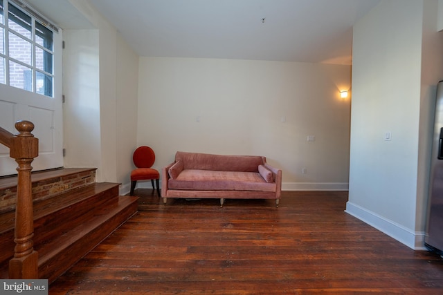 living area with dark wood-type flooring