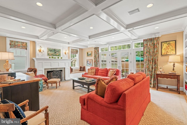 living room featuring coffered ceiling, french doors, and beamed ceiling