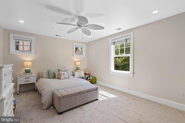 carpeted bedroom with ceiling fan