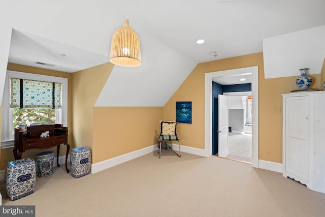 bonus room with lofted ceiling and carpet floors