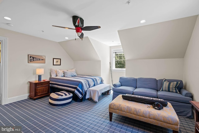 bedroom featuring vaulted ceiling, ceiling fan, and dark colored carpet