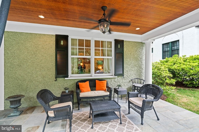 view of patio / terrace featuring ceiling fan