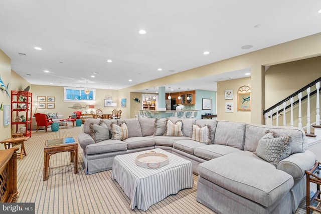 living room featuring light carpet