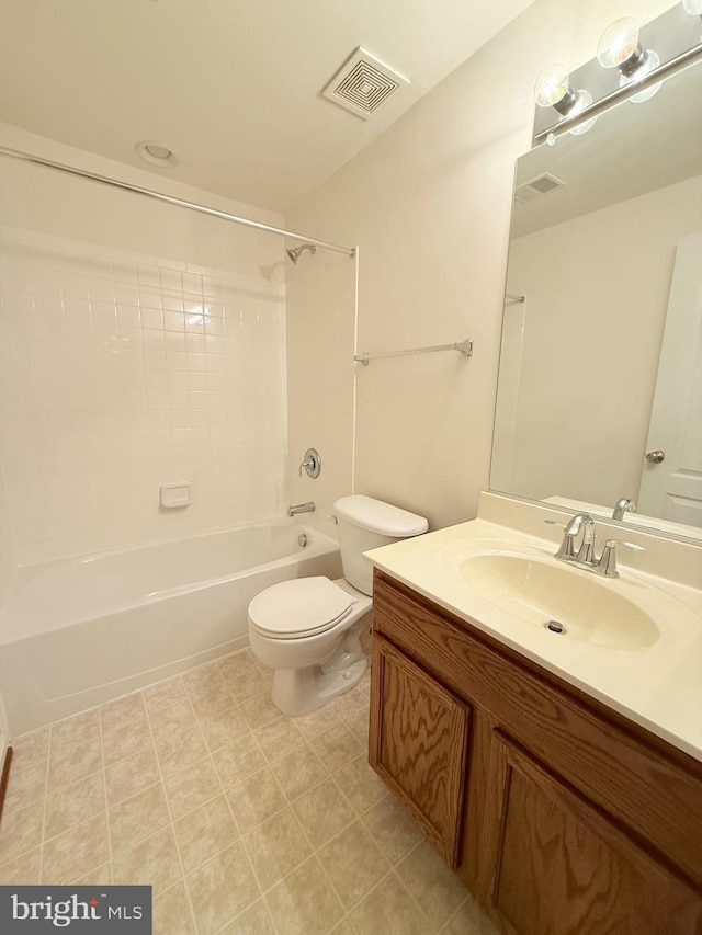 full bathroom featuring vanity, toilet, and tiled shower / bath combo