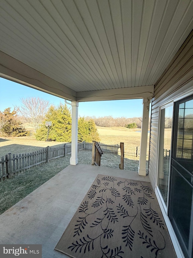 view of patio / terrace featuring a rural view