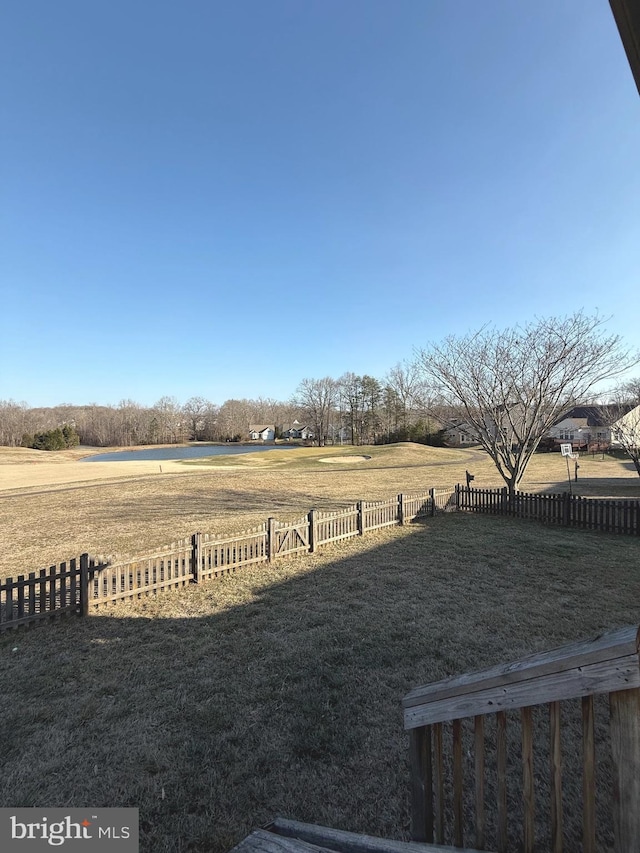 view of yard with a rural view