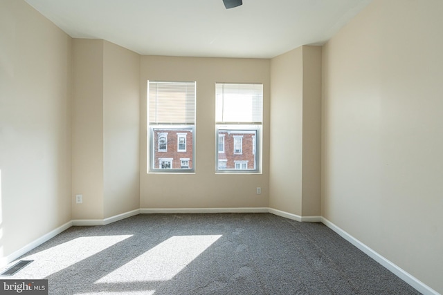 view of carpeted spare room