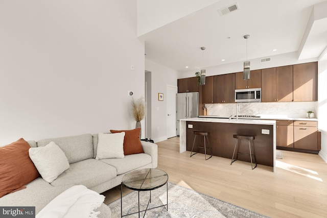 living room featuring light wood-type flooring