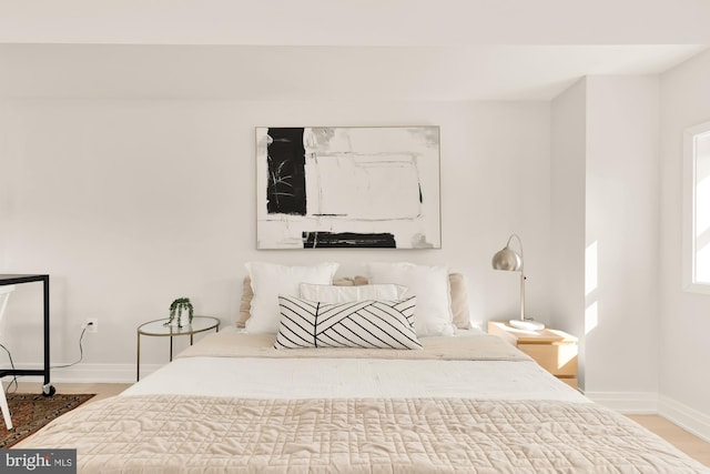 bedroom with wood-type flooring