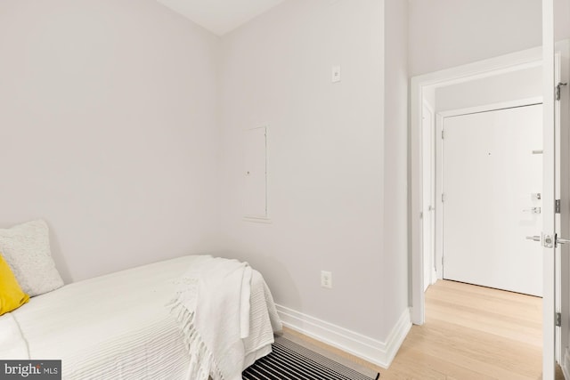 bedroom with light wood-type flooring