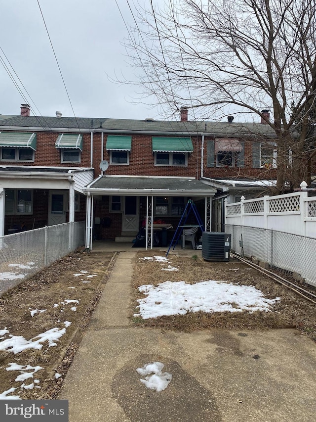 view of front of home featuring central AC unit