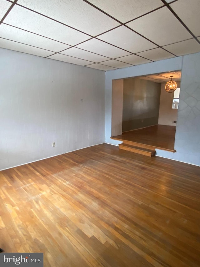 unfurnished room featuring wood-type flooring