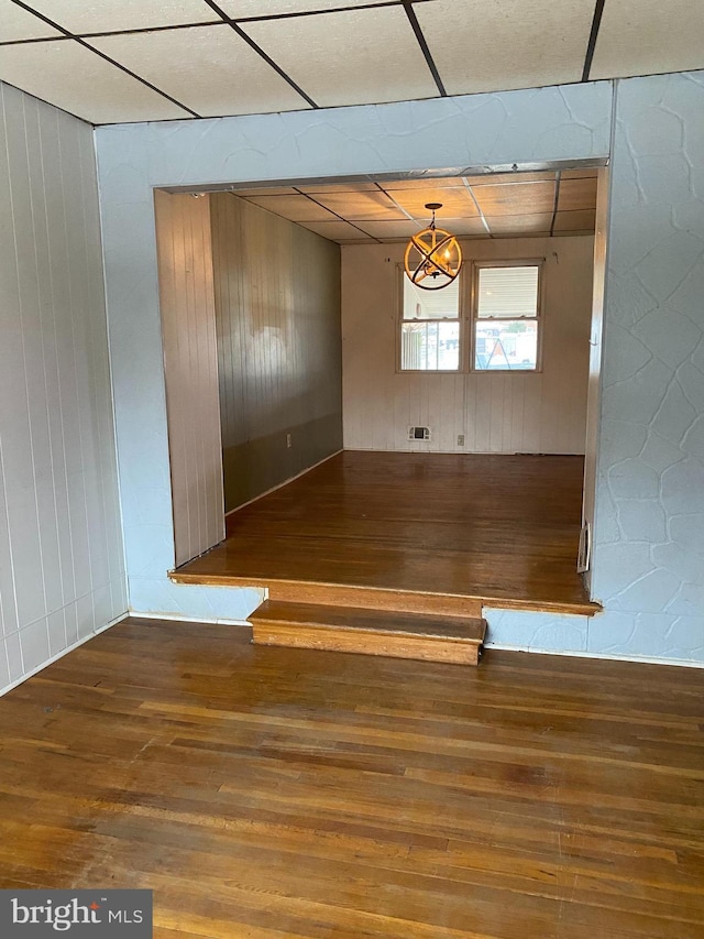 empty room with wood-type flooring