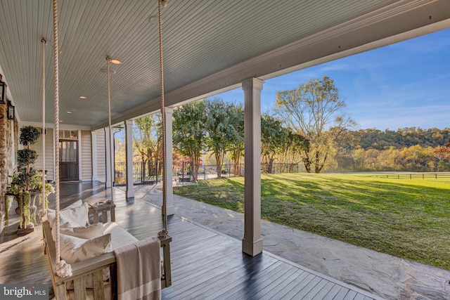 wooden deck with a yard