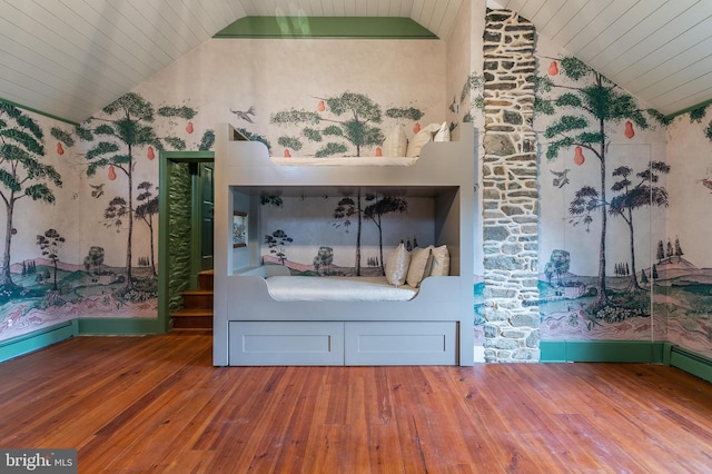 unfurnished bedroom with vaulted ceiling, wood-type flooring, and wooden ceiling