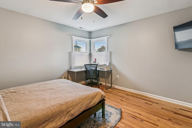 bedroom featuring ceiling fan and light wood-type flooring