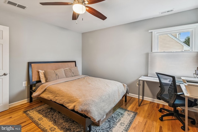 bedroom featuring ceiling fan and light wood-type flooring