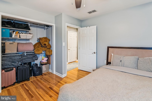 bedroom with wood-type flooring