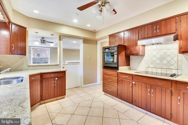 kitchen with sink, black appliances, light tile patterned floors, ceiling fan, and backsplash