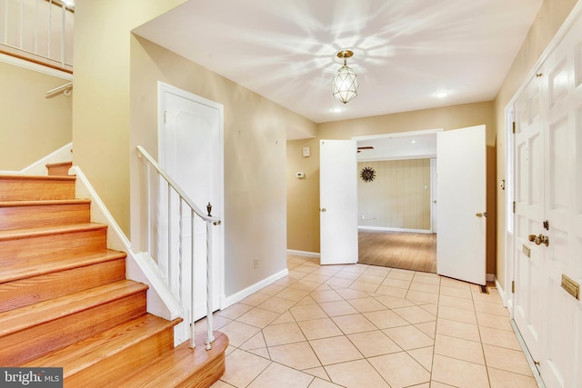 foyer entrance featuring light tile patterned floors