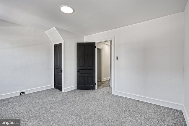 unfurnished bedroom featuring carpet