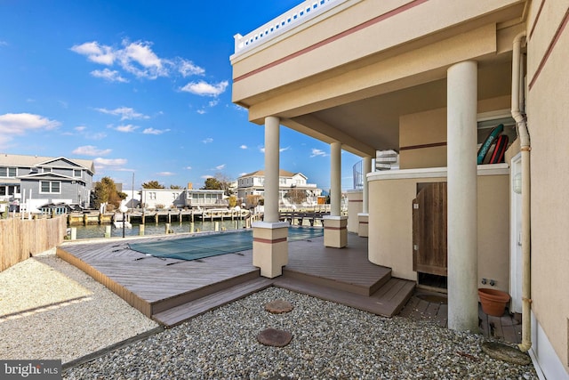 view of swimming pool with a water view