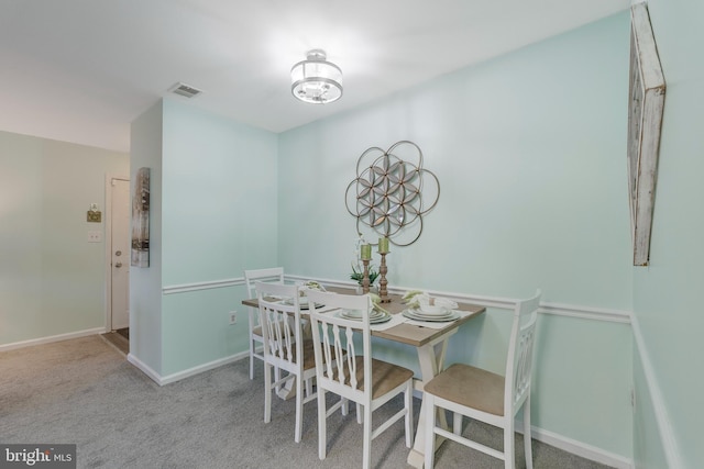 view of carpeted dining room