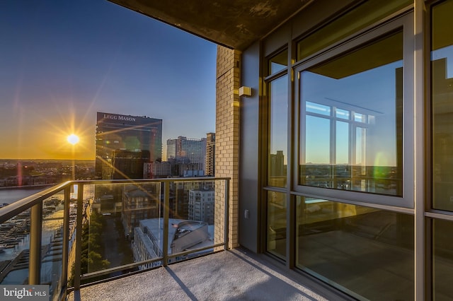 view of balcony at dusk