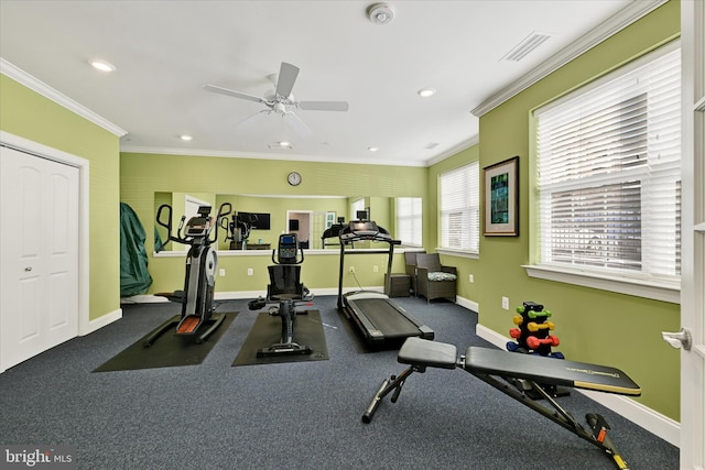 exercise area featuring crown molding and ceiling fan