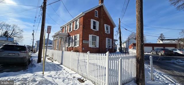 view of snow covered property