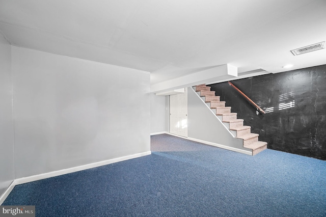 basement featuring carpet flooring