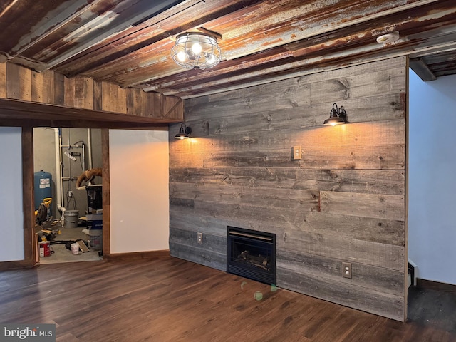 basement featuring wooden walls, wooden ceiling, and dark hardwood / wood-style floors