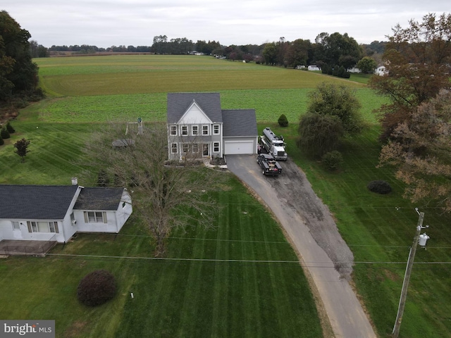 birds eye view of property featuring a rural view