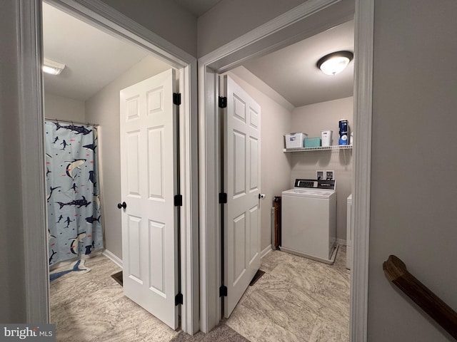 laundry area with independent washer and dryer