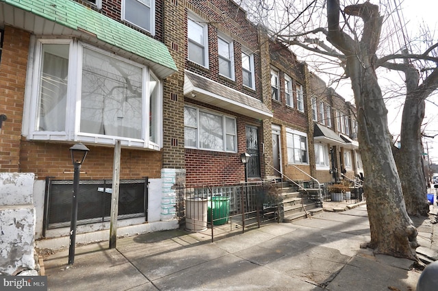 view of property with central AC unit