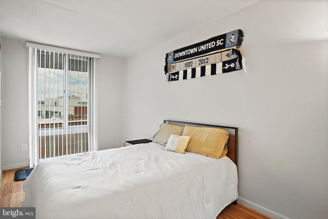 bedroom featuring hardwood / wood-style floors