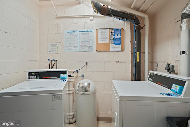 laundry area with washer and clothes dryer