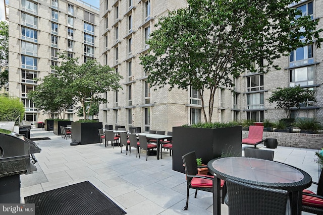 view of patio / terrace featuring a grill